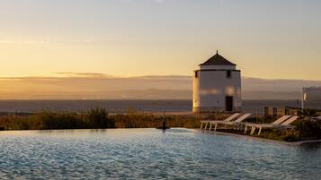 Indoor pool, outdoor pool, pool umbrellas, sun loungers