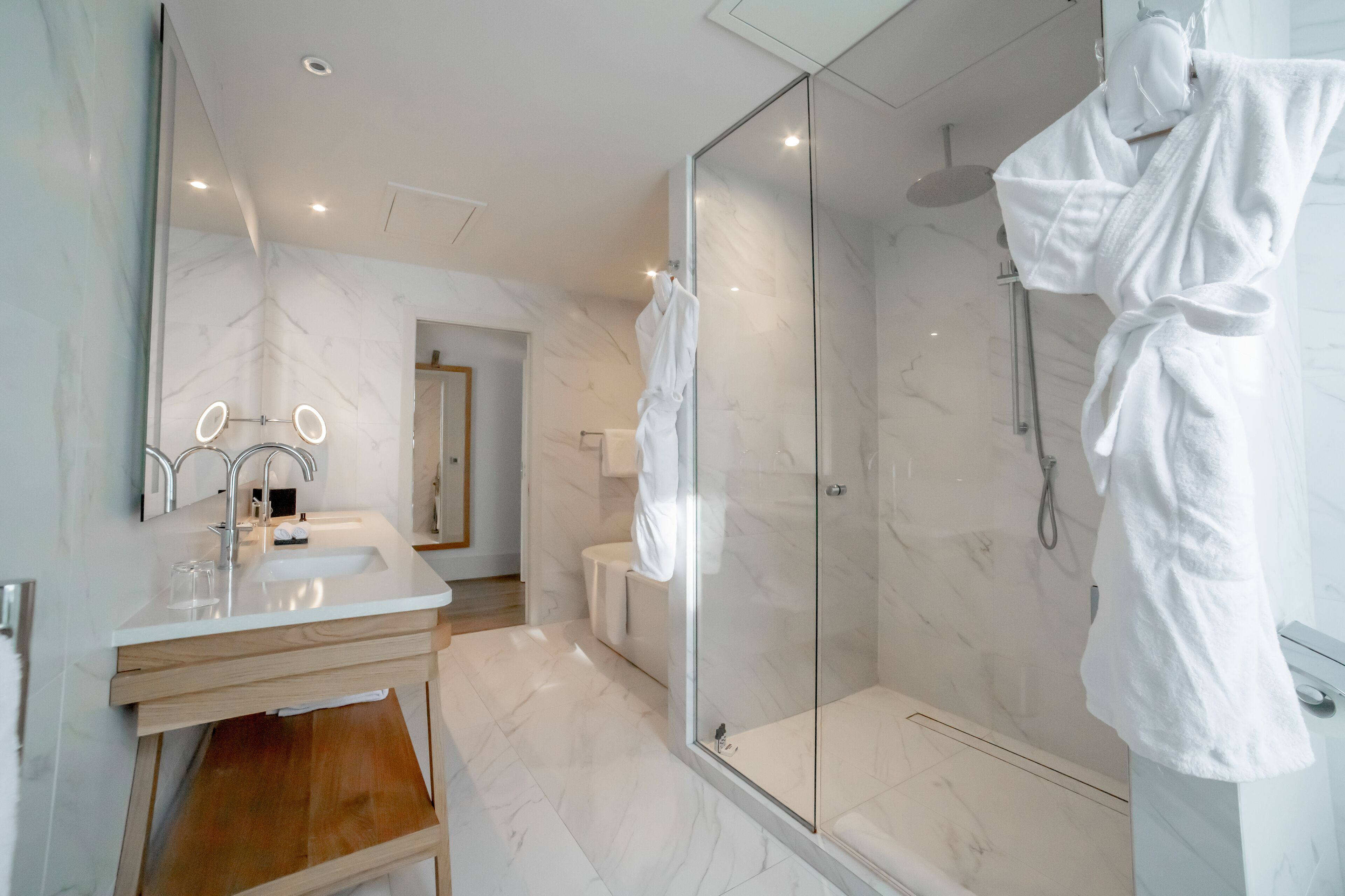 superior suite | bathroom | designer toiletries, hair dryer, bathrobes, slippers
