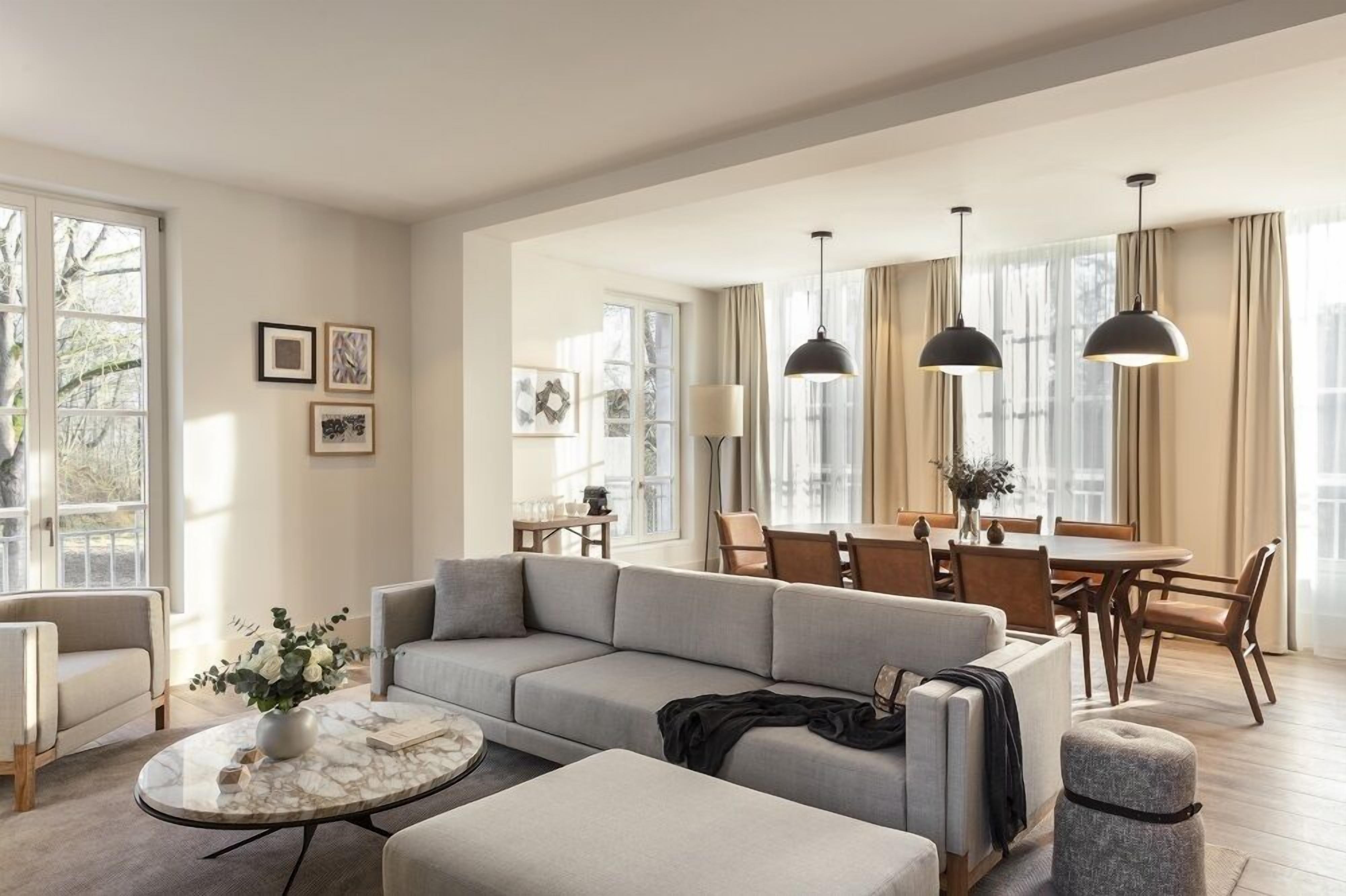 Luxury Suite | Living area | Flat-screen TV, toys