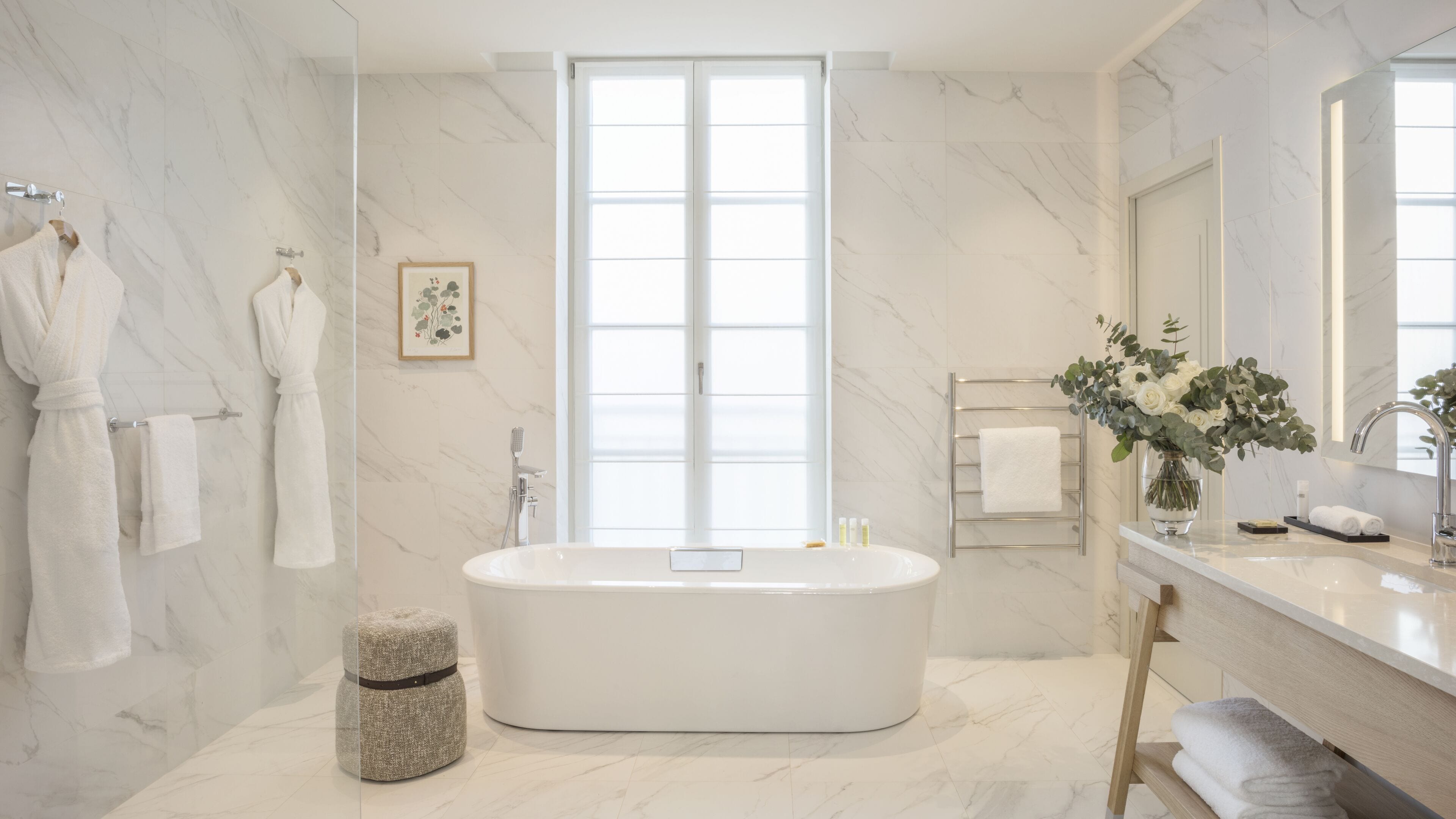 designer toiletries, hair dryer, bathrobes, slippers