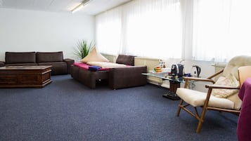 Comfort Room, Multiple Beds, Shared Bathroom | Desk, laptop workspace, iron/ironing board, free WiFi
