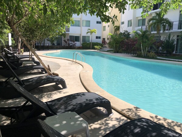 Outdoor pool, open 7:00 AM to 11:30 PM, free pool cabanas