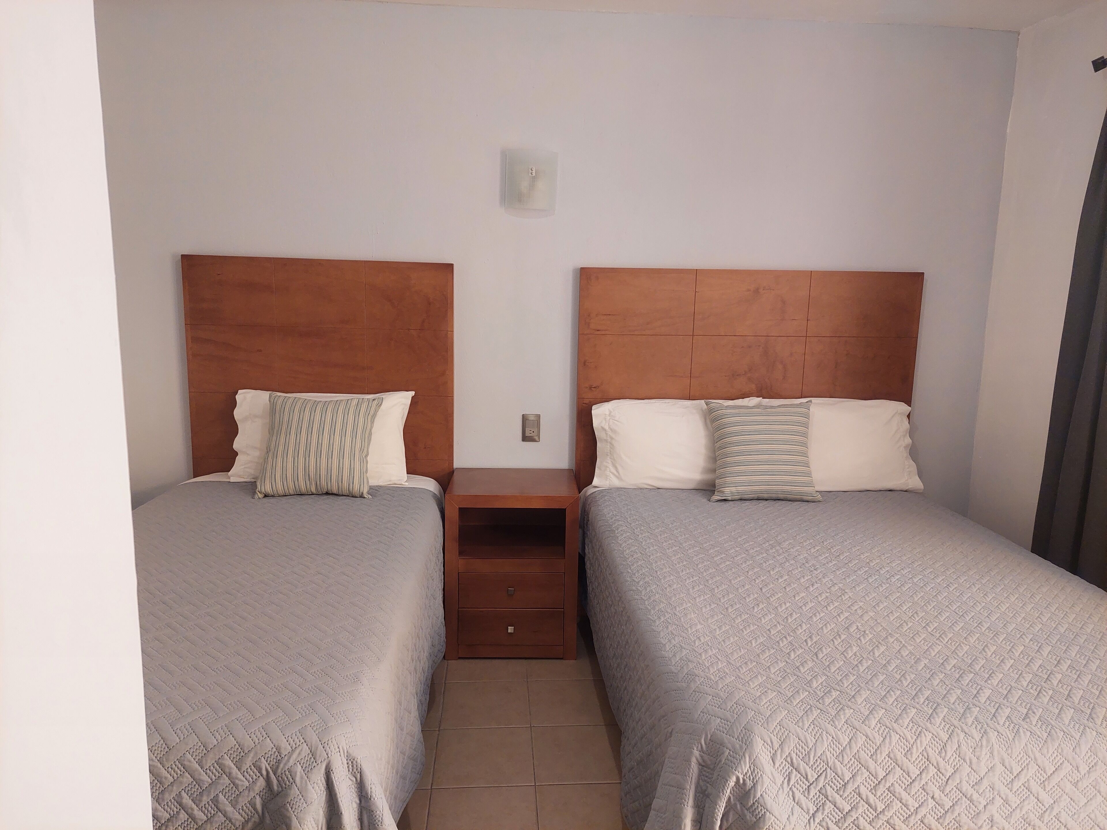 triple room, multiple beds | 1 bedroom, individually furnished, desk, laptop workspace