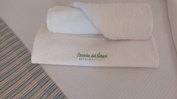 Shower, free toiletries, towels, soap