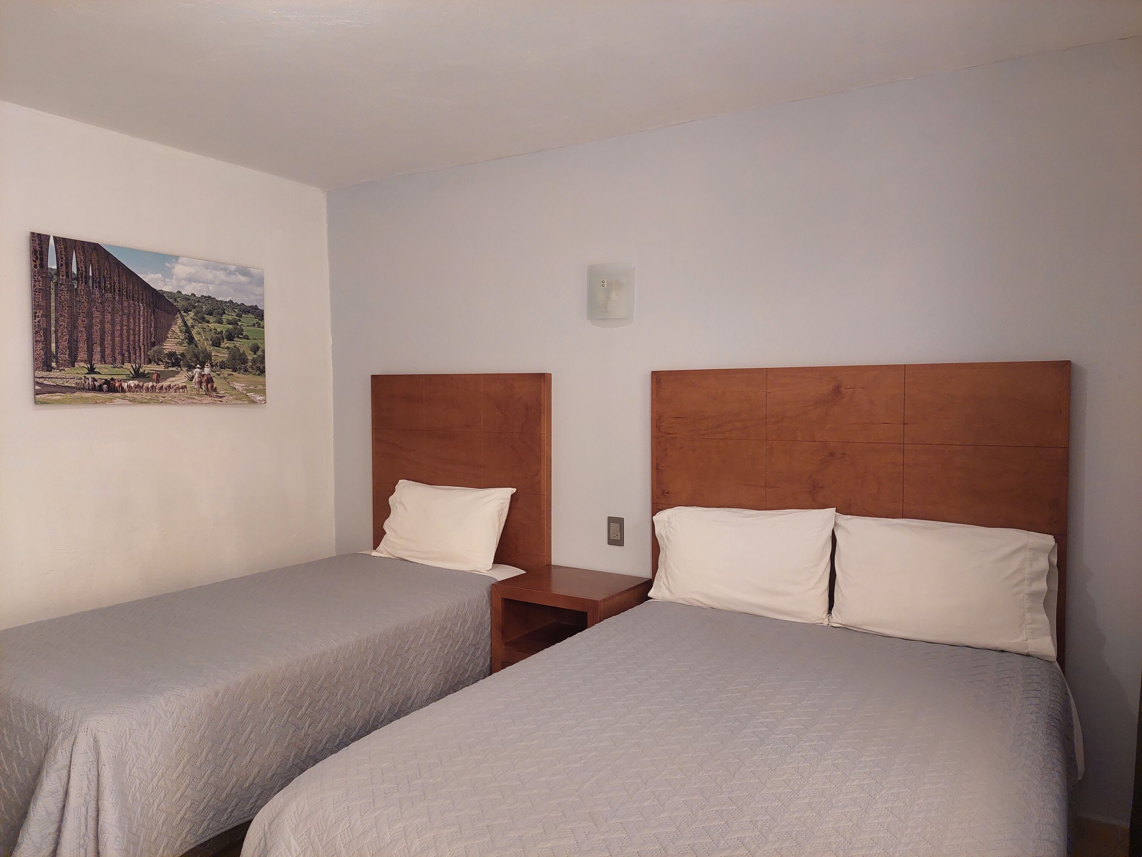 triple room, multiple beds | 1 bedroom, individually furnished, desk, laptop workspace