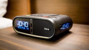 A digital alarm clock with a display showing 10:40.