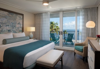 In-room safe, individually decorated, individually furnished, desk at The Laureate Key West