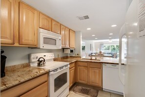 Fridge, microwave, oven, stovetop - Surf Court 30 - Updated 2 Bedroom Condo - Short Walk to Beach (Hilton Head Island)