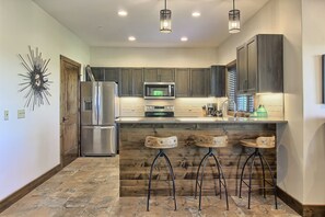 Fridge, microwave, oven, stovetop - New 2BR Ski In/Ski Out Creekside Condo | Complete Remodel | Private Hot Tub (Boyne City)