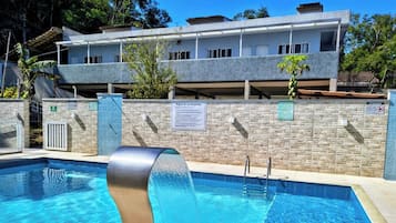 Outdoor pool, open 10 AM to 9 PM, pool umbrellas, pool loungers