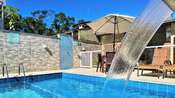Outdoor pool, open 10 AM to 9 PM, pool umbrellas, pool loungers