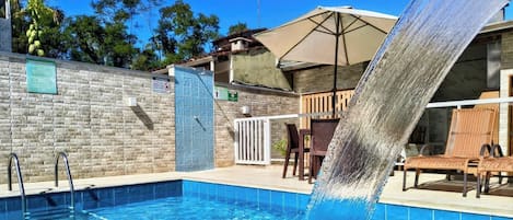 Outdoor pool, open 10 AM to 9 PM, pool umbrellas, sun loungers