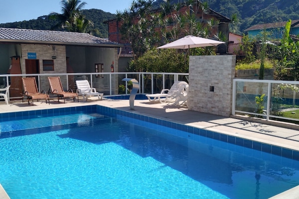 Outdoor pool, open 10 AM to 9 PM, pool umbrellas, sun loungers