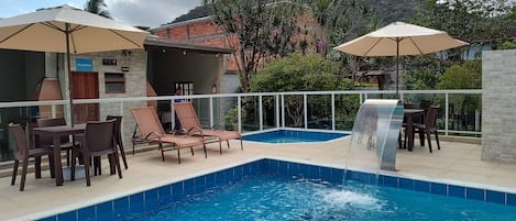 Outdoor pool, open 10 AM to 9 PM, pool umbrellas, sun loungers