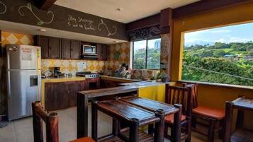 32-inch flat-screen TV with digital channels, Netflix, pay films