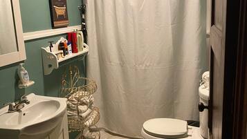 Hair dryer, towels, soap, shampoo
