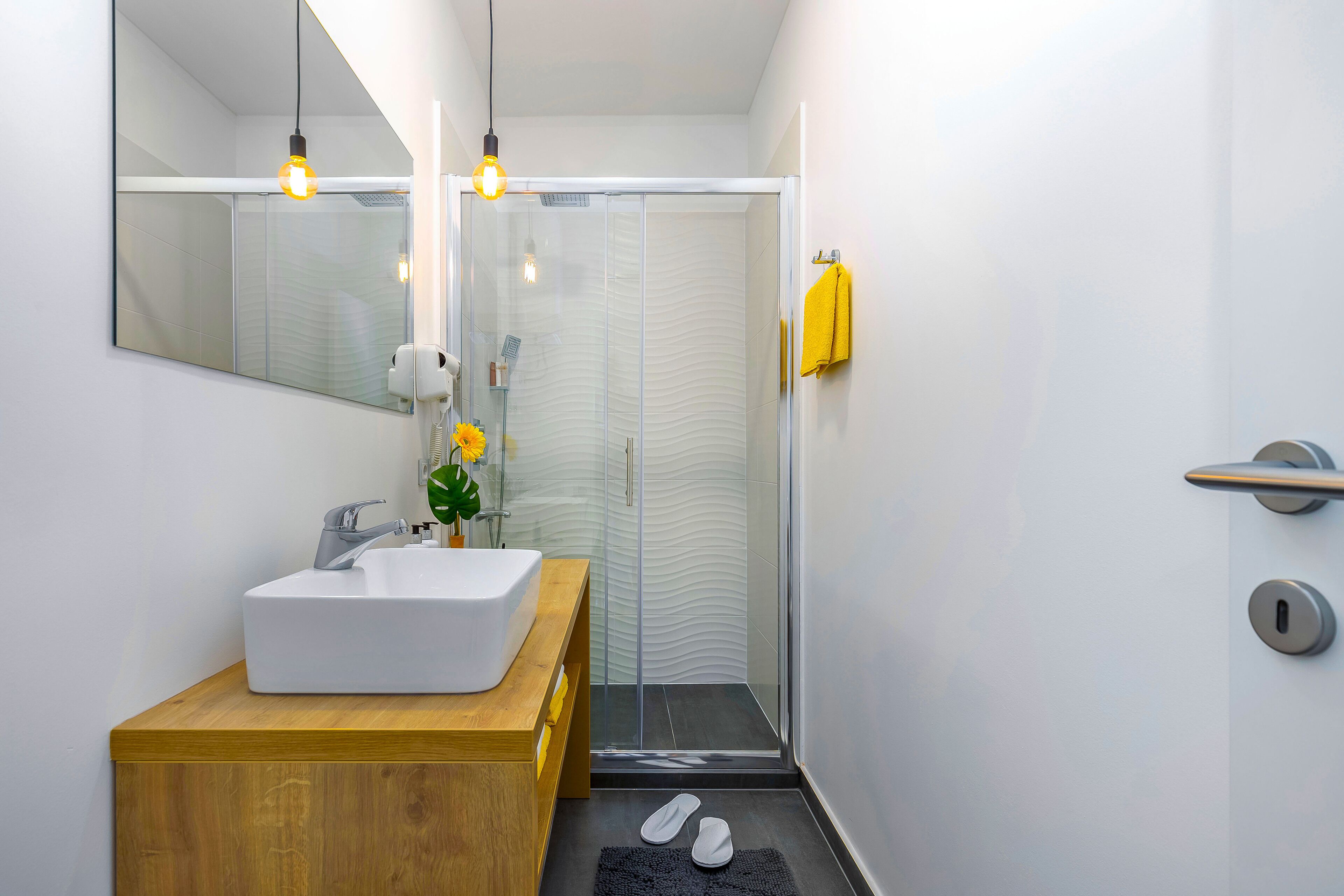 Bathtub, hair dryer, towels, soap