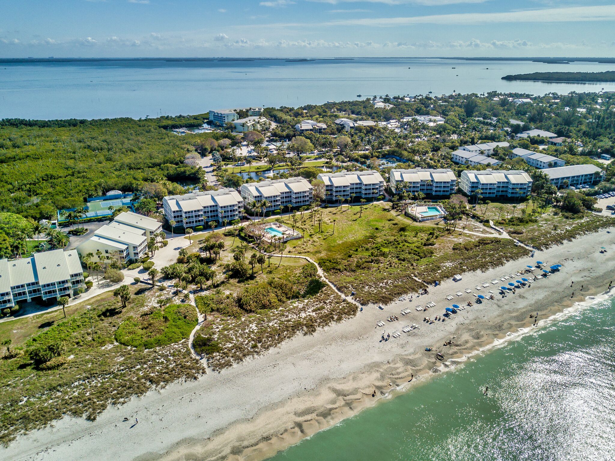 On the beach, sun-loungers, beach towels