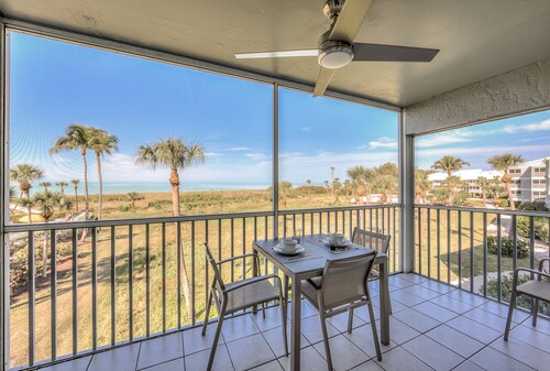 Stunning Modern beach front unit - completely renovated!  Includes golf cart!