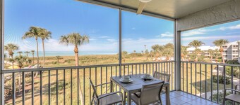 Stunning Modern beach front unit - completely renovated! Includes golf cart!