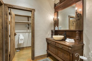 Shower, hair dryer, towels, shampoo