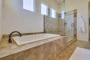 Shower, hair dryer, towels, shampoo