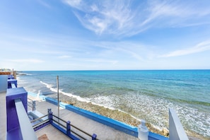 On the beach, sun-loungers, beach towels