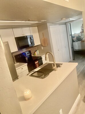 Fridge, microwave, oven, stovetop