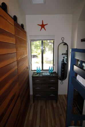 Family Room, Multiple Beds (1 King Bed and 1 Bunk Bed) | Individually decorated, individually furnished, laptop workspace