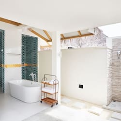 Separate tub and shower, rainfall showerhead, free toiletries