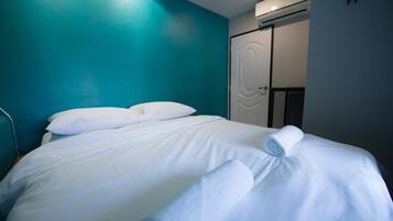Basic Double or Twin Room | Blackout drapes, iron/ironing board, free WiFi, bed sheets