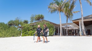 Private beach, white sand, sun loungers, beach towels