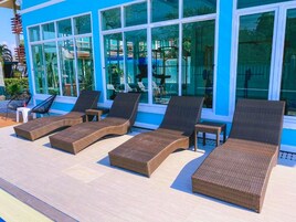 Outdoor pool, open 6:00 AM to noon, sun loungers