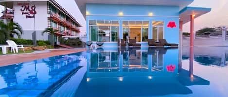 Outdoor pool, open 6:00 AM to noon, pool loungers