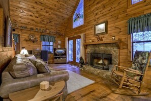 Flat-screen TV, fireplace, DVD player