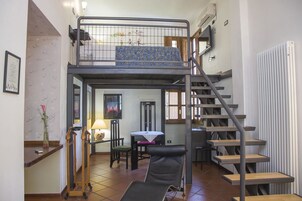 Business Duplex | Living area | Flat-screen TV