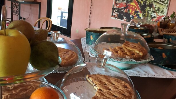 A breakfast buffet with various pastries and fruits on display. - Aliajazz hotel (Castrovillari)