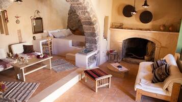 Cottage, 2 Double Beds, Non Smoking | Living area | Fireplace
