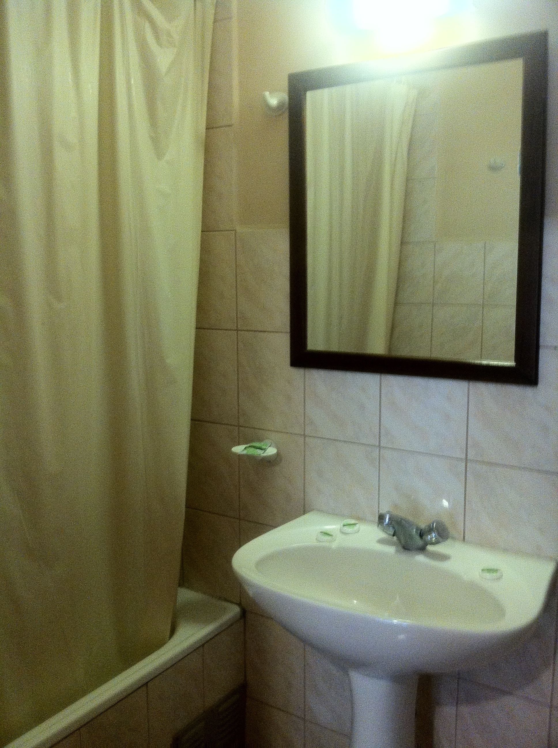 family room, multiple beds, private bathroom | bathroom | shower, hair dryer, towels