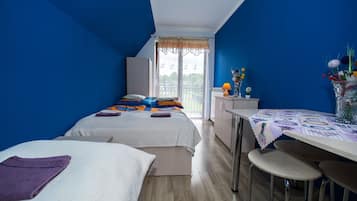 Kamar Triple (3) | Seprai premium, setrika/meja setrika, Wi-Fi gratis, dan seprai linen
