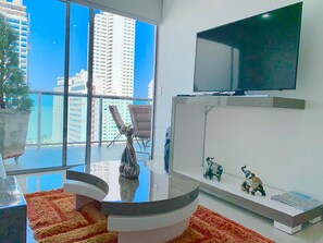 Deluxe Apartment | Living area | 60-inch Smart TV with cable channels - Top Apartment Cartagena Colombia (Cartagena)