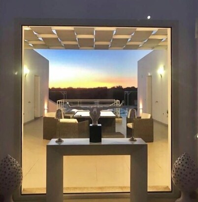 A modern villa set between Sava and Campomarino in a peaceful private setting.
