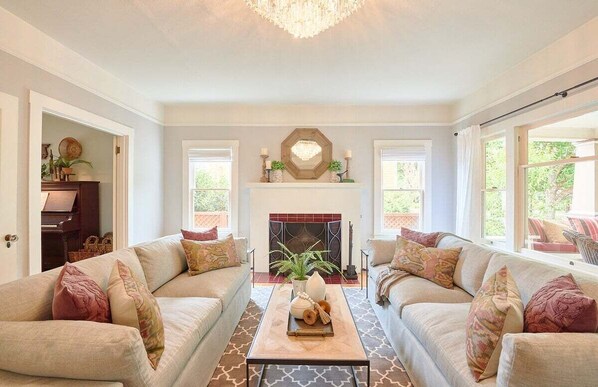 TV, fireplace, books