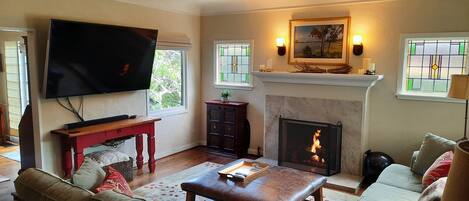 Smart TV, fireplace, DVD player, books