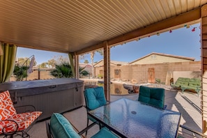 Outdoor dining - Backyard oasis with private solar heated pool, hot tub and tons of amenities! (San Tan Valley)