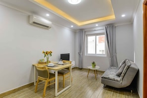Appartement, 1 chambre | Coin séjour