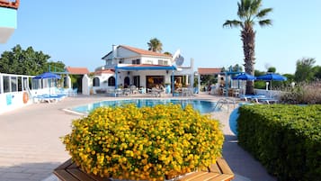 Outdoor pool, pool umbrellas, pool loungers