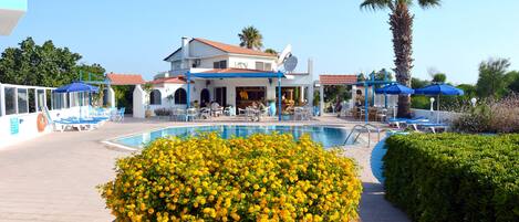 Outdoor pool, pool umbrellas, pool loungers