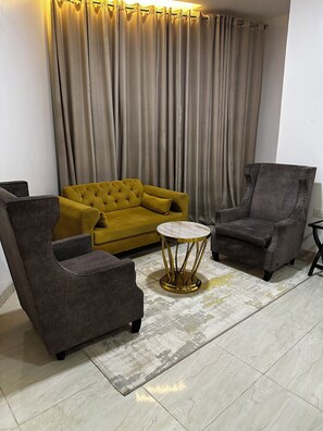 Superior Room | Living area | 43-inch flat-screen TV with cable channels, TV - Rollace Hotel Lagos INTL (Lagos)