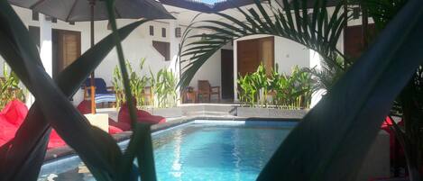 Outdoor pool, free pool cabanas, pool umbrellas